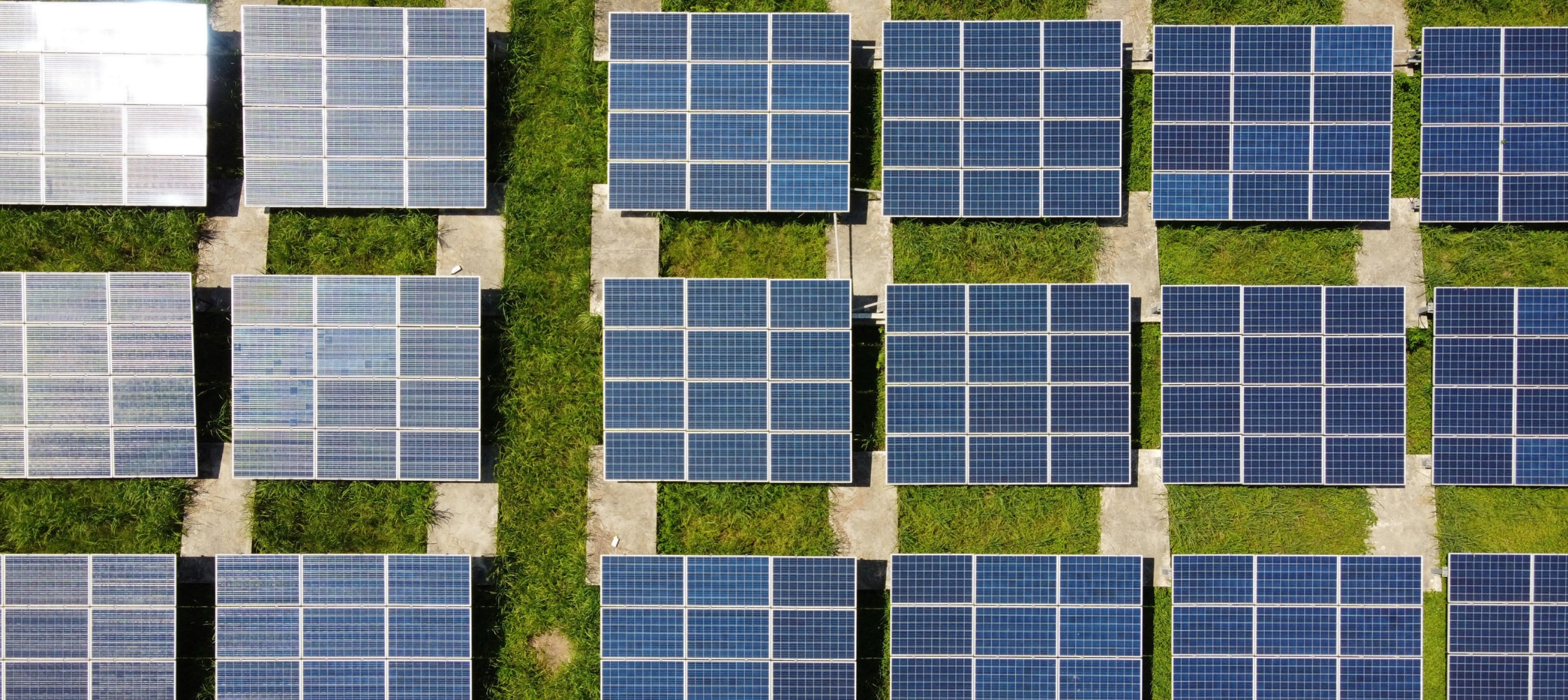 Picture of solar panels from above to represent climate change and the need for business sustainability